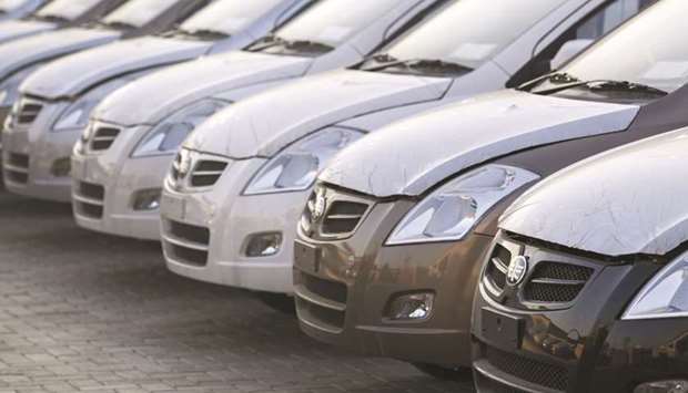 Vehicles sit at an assembly plant in Karachi. Automakers sold 43% fewer cars during the first half of the current financial year to December from a year ago, according to the car industry sales numbers released by the Pakistan Automotive Manufacturers Association.