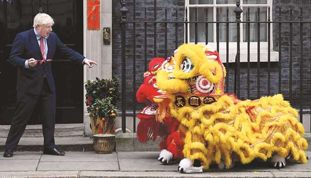 British Prime Minister Boris Johnson gestures as he watches a performance during celebrations for Chinese Lunar New Year at Downing Street in London on Friday. Market sentiment has improved amid expectations Johnsonu2019s new parliamentary majority will unleash a wave of government and private spending to revive growth. Decemberu2019s general election helped ease the UKu2019s political paralysis and swept away fears of a messy divorce from the European Union on January 31.