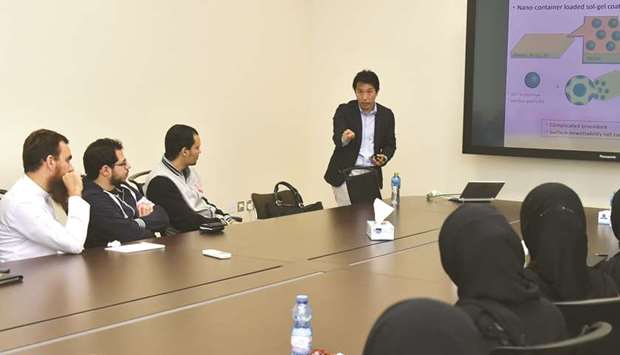 Prof Yamauchi addresses a seminar on Nanoarchitectured Porous Materials with  international researchers.
