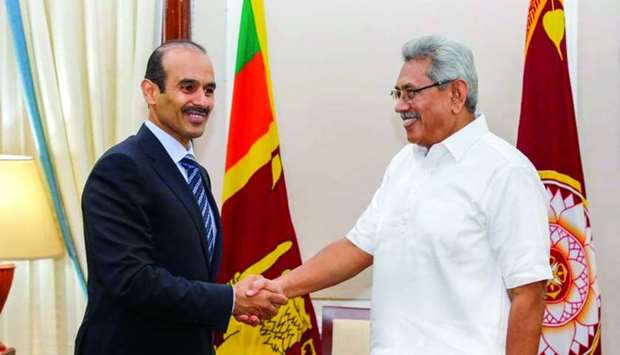 HE the Minister of State for Energy Affairs Saad bin Sherida al-Kaabi shakes hand with Sri Lankan President Gotabaya Rajapaksa