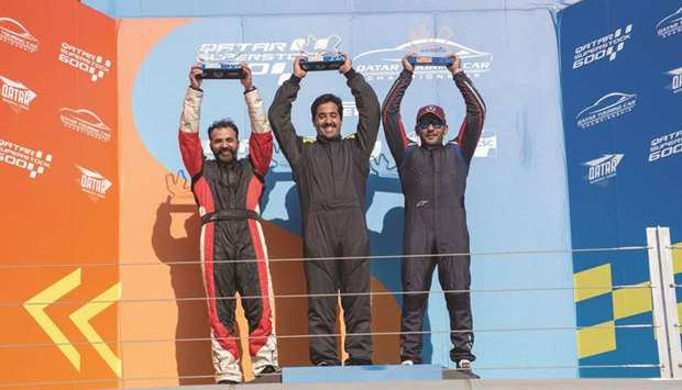 Ghanim al-Maadheed celebrates his win at the Losail International Circuit.