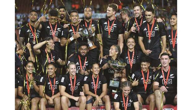 New Zealand menu2019s and womenu2019s team celebrate winning their rugby final matches during day two of the World Rugby Sevens series at FMG Stadium in Hamilton yesterday.