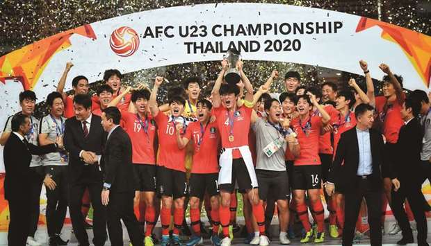 South Korean players celebrate winning AFC U23 Championship at the Rajamangala Stadium in Bangkok yesterday. (AFP)