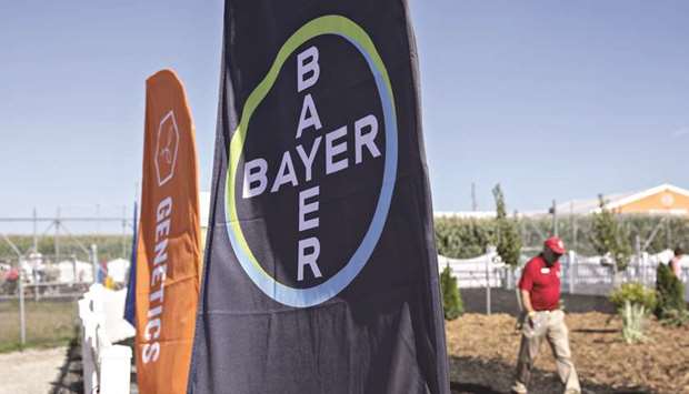 A Bayer signage is displayed at the companyu2019s booth during the Farm Progress Show in Decatur, Illinois. Bayeru2019s Roundup has been blamed for ailments including non-Hodgkinu2019s lymphoma, which can take years to diagnose.