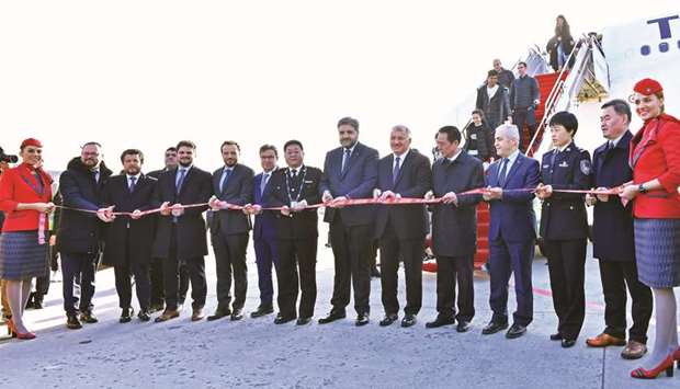 Officials at a ceremony held to mark the inaugural flight.