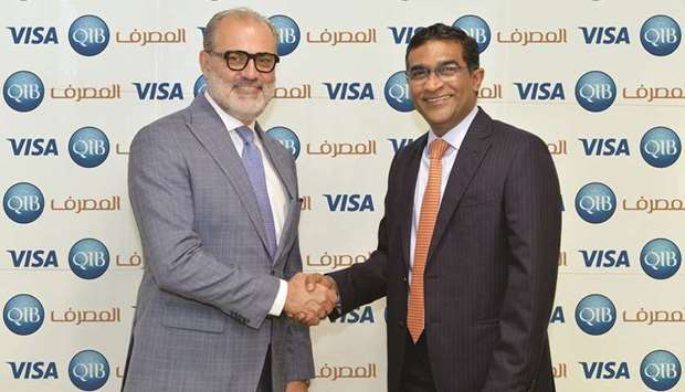QIB Personal Banking Group general manager D Anand and Marcello Baricordi, VISAu2019s general manager for Middle East and North Africa, shaking hands after the announcement of the partnership.