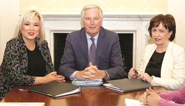 Northern Irelandu2019s Deputy First Minister Michelle Ou2019Neill (left) and Economy Minister Diane Dodds (right) meet EUu2019s chief Brexit negotiator Michel Barnier at Stormont Castle on the Stormont Estate in Belfast yesterday.