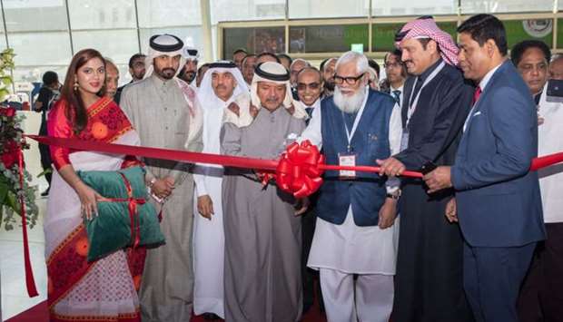 Al-Khater, Sheikh Faisal and Rahman leading the ribbon-cutting ceremony of the ,Made in Bangladesh, exhibition