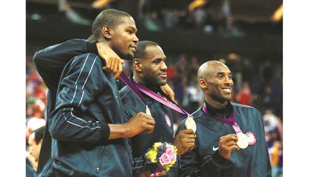File photo of Kevin Durant (left), Lebron James (centre) and Kobe Bryant posing with their gold medals during the London 2012 Olympic Games on August 12, 2012. (Reuters)