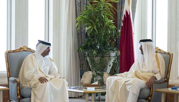 His Highness the Amir Sheikh Tamim bin Hamad Al-Thani with H E Sheikh Khalid bin Khalifa bin Abdulaziz Al Thani who was appointed as Prime Minister and Minister of Interior