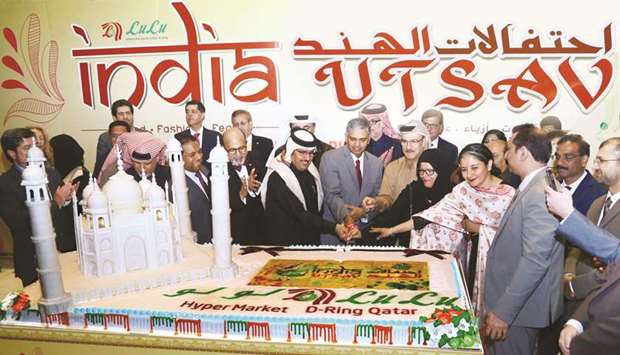 Indian ambassador P Kumaran and Qatari and Indian dignitaries cut a cake to mark the opening of u2018India Utsav 2020u2019 at LuLu Hypermart, D-Ring Road. PICTURES: Jayan Orma