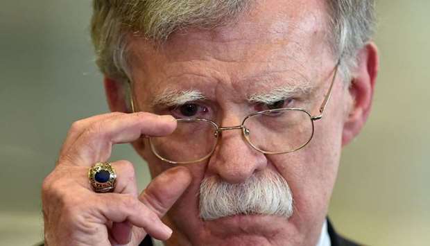 In this file photo taken on August 29, 2019 US National Security Advisor John Bolton answers journalists questions after his meeting with Belarus President in Minsk
