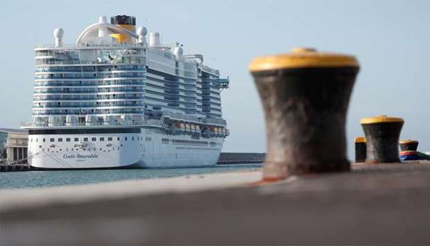 Passengers are seen onboard the Costa Smeralda cruise ship of Costa Crociere, carrying around 6,000 passengers, as it sits docked at the Italian port of Civitavecchia following a health alert due to a Chinese couple and a possible link to coronavirus, in Civitavecchia, Italy