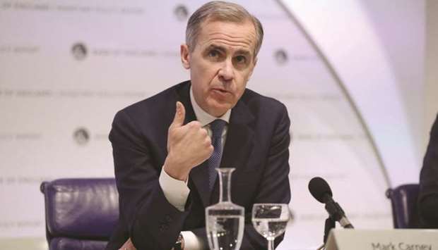 BoE governor Mark Carney speaks during the Monetary Policy Report news conference in London yesterday. Carney pointed to encouraging signs for the economy in early 2020 but said the BoE was waiting to see if this would be borne out in hard economic data.