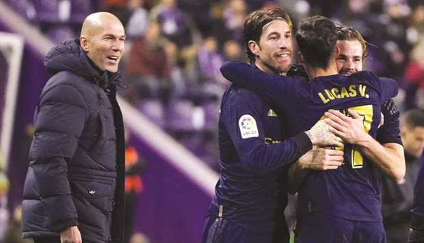 And as Atletico have floundered, Real Madrid under Zinedine Zidane (left) have flourished in the La Liga, extending an unbeaten run to 20 matches, during which they have conceded only nine goals and scored 45. (AFP)