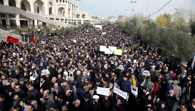 Demonstrators attend a protest against the assassination of the Iranian Major-General Qassem Soleimani, head of the elite Quds Force, and Iraqi militia commander Abu Mahdi al-Muhandis who were killed in an air strike in Baghdad airport, in Tehran