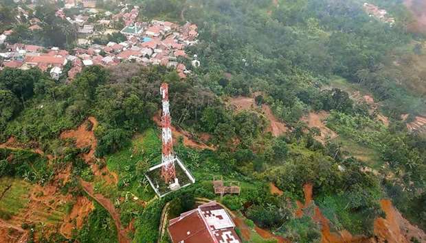 Indonesian national board for disaster management (BNPB) shows a landslide area at Pasir Madang village in Bogor, after torrential rains began to hit the area on December 31