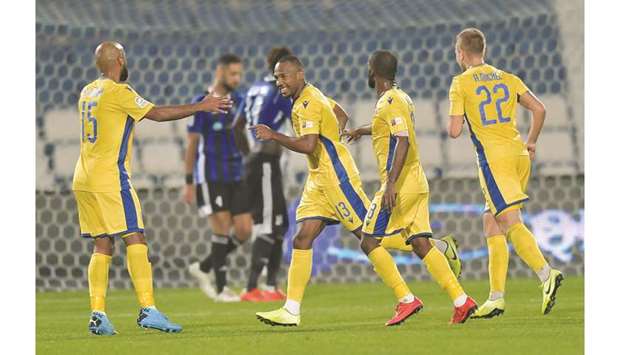 Al Khoru2019s Ibrahim Amada (second from left) celebrates his goal against Al Sailiya with his teammates during their QNB Stars League match yesterday. PICTURE: Noushad Thekkayil