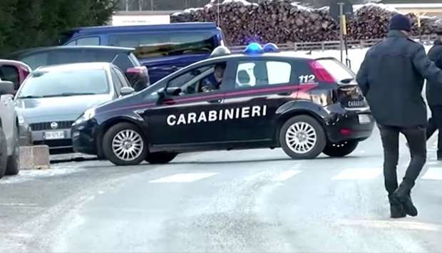 A Carabinieri military police car is seen near the site where suspected drunk driver fatally struck a group of German tourists in Lutago, Italy
