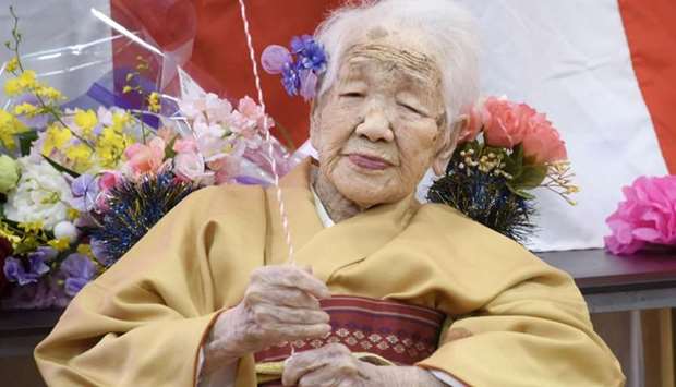 Kane Tanaka, born in 1903, smiles as a nursing home celebrates three days after her 117th birthday in Fukuoka, Japan. Kyodo/via REUTERS