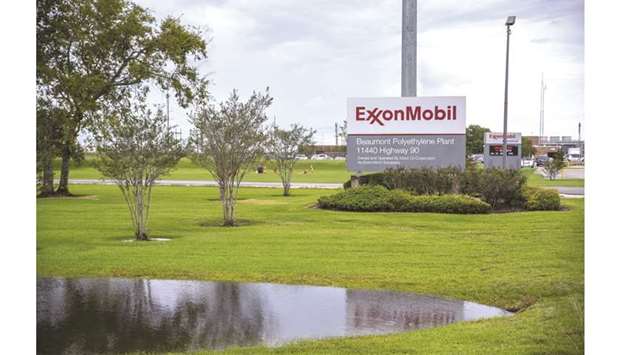 A signage stands outside the Exxon Mobil Corp Beaumont Polyethylene Plant in Beaumont, Texas. Exxon wasnu2019t given sufficient notice that the 2014 contracts with a powerful ally of Russian President Vladimir Putin would violate restrictions put in place after Russia annexed the Crimea region of Ukraine, US District Judge Jane Boyle said in a ruling in Dallas.