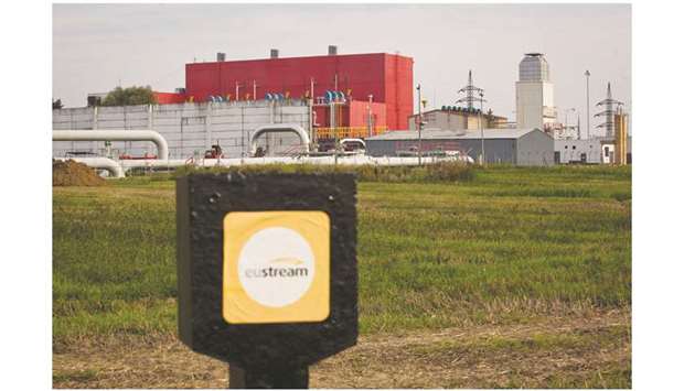 An Eustream sign stands on land surrounding the SK-UA reverse flow compressor station for the Vojany Uzhorod gas pipeline, operated by Slovak pipeline operator Eustream in Velke Kapusany, Slovakia (file). The decline in flows may also be related to the new contracts agreed  between Ukraine and Russia,  according to Katja Yafimava, a senior research fellow at the Oxford  Institute for Energy Studies.