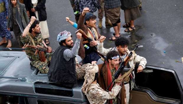 Yemeni Huthi rebels take part in a demonstration in Sanaa Monday to denounce the killing of Iranian major general Qassem Soleimani and Iraqi paramilitary chief Abu Mahdi al-Muhandis.