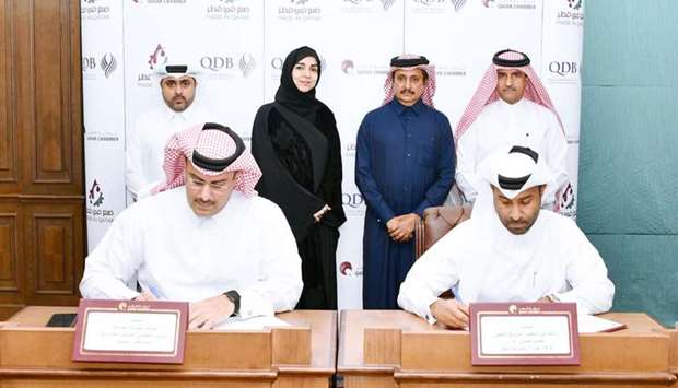 Qatar Chamber board member and chairman of the Industry Committee Rashid bin Nasser al-Kaabi and QDB executive director of Business Finance Khalid Abdulla al-Mana signing the partnership agreement for 'Made in Qatar' 2020 slated for next month in Kuwait.