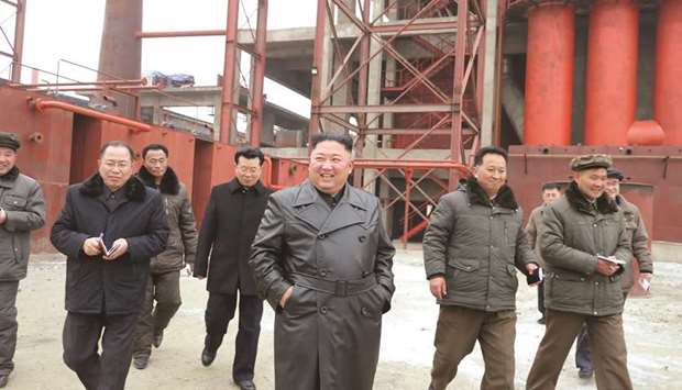 North Korean leader Kim Jong-un gives field guidance at Sunchon Phosphatic Fertilizer Factory under construction.