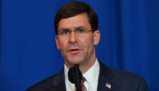 US Secretary of Defense Mark Esper speaks onstage during a briefing on the past 72 hours events in Mar a Lago, Palm Beach, Florida on December 29, 2019