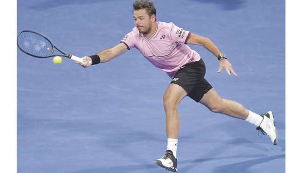 Stan Wawrinka of Switzerland returns during the Qatar ExxonMobil Open second round match against Frenchman Jeremy Chardy (not pictured) at Khalifa International Tennis and Squash Complex in Doha yesterday. PICTURES: Noushad Thekkayil