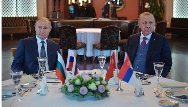 Russian President Vladimir Putin and Turkish President Recep Tayyip Erdogan attend a meeting on in Istanbul