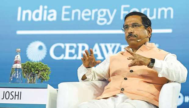 Pralhad Joshi, Indiau2019s minister of coal and mines, speaks during the India Energy Forum in New Delhi. Joshi said the government has amended mining laws to fast-track mining at sites where leases have lapsed, to avert an iron ore shortage.