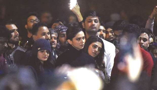 Bollywood actress Deepika Padukone (centre) visits students protesting at Jawaharlal Nehru University (JNU) against a recent attack at JNU on students and teachers in New Delhi.