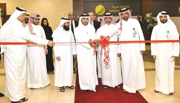 Al Meera officials and government executives lead the ribbon-cutting ceremony of the Rawdat Al Hamama branch yesterday. PICTURE: Nasar K Moidheen