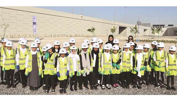 Students from Al Khansaa School For Girls at the tree planting venue.