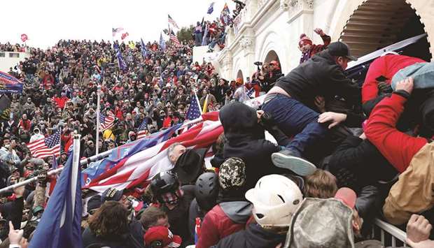 This picture taken on Wednesday shows pro-Trump protesters storming the US Capitol during clashes with police.