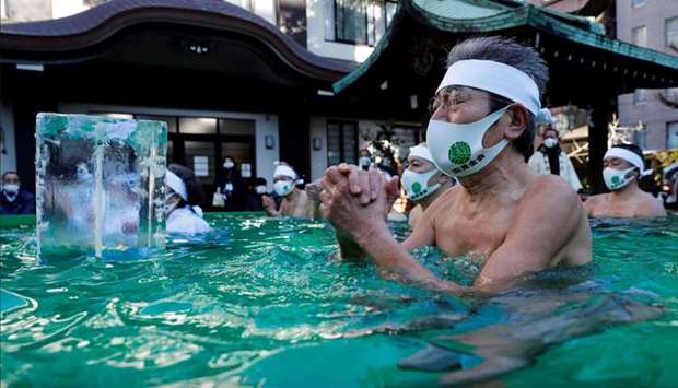 Participants are seen wearing face masks.