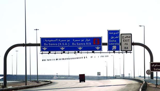 A truck moves on a road leading to Qatar's Abu Samra border crossing with Saudi Arabia on January 9, after the two countries restored ties and opened borders. S&P said the reopening of the airspace as well as sea and land borders in an effort to end the longstanding diplomatic dispute could have a ,positive, effect on the business growth and investment returns of Qatari insurers in the medium term.