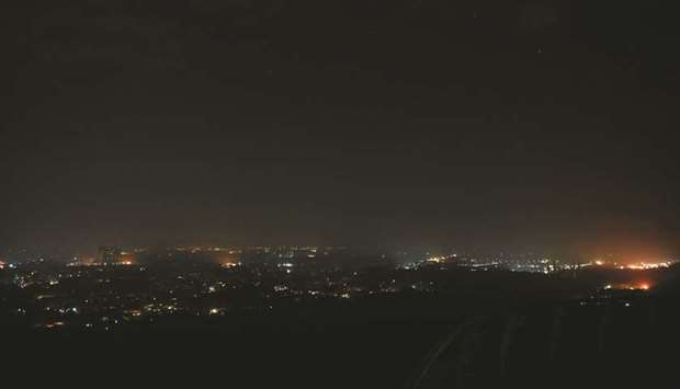 A general view of the federal capital Islamabad during a power blackout yesterday. (AFP)