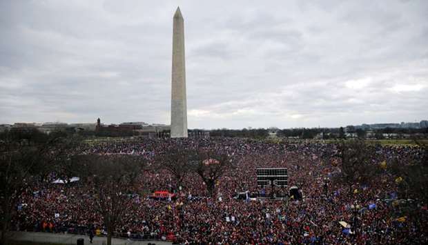 Supporters of US President Donald Trump gather at the Washington Monument by the White House during a rally to contest the certification by the US Congress of the results of the 2020 US presidential election in Washington.