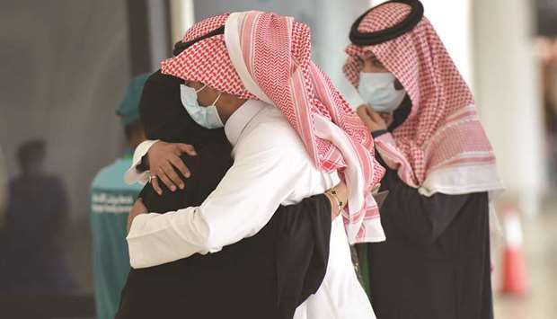 Pictures show emotional scenes as people welcome their relatives who arrived from Doha at King Khalid International Airport in Riyadh yesterday.