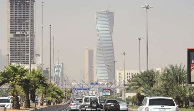 Saudi commuters drive down a main street in the capital Riyadh (file). Business surveys in recent months showed a rebound in Saudi economic activity, partly due to pent up consumer demand, although economists have said the VAT hike has weighed on the pace of recovery.