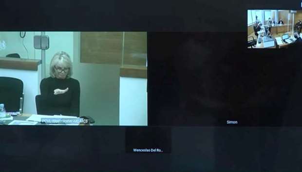 Corinna Larsen, close personal friend of former Spanish King Juan Carlos, testifies in court by video conference from London in a case involving allegations by former police chief Jose Manuel Villarejo that she had received threats from the head of the intelligence service over her access to the royal family's financial documents in this frame grab from video shot from Madrid's Supreme Court in Madrid, Spain