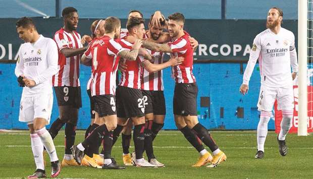 Athletic Bilbaou2019s Raul Garcia (third right) celebrates with teammates after scoring during the Spanish Super Cup semi-final against Real Madrid in Malaga. (AFP)
