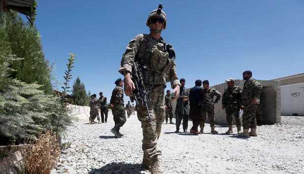 An US soldier keeps watch at an Afghan National Army (ANA) base in Logar province, Afghanistan