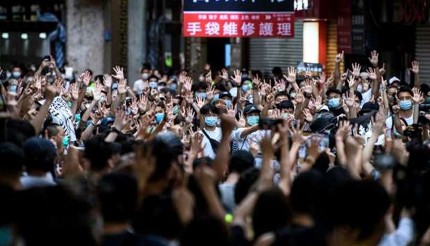 Five Hong Kong democracy protesters seek asylum in the US