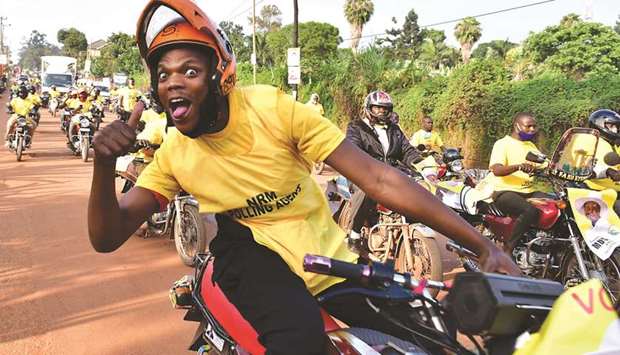 Supporters of Ugandau2019s National Resistance Movement (NRM) party celebrate the victory of President Yoweri Museveni in the concluded general elections in Kampala.