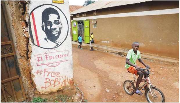 A graffiti calling to free Ugandan opposition presidential candidate Robert Kyagulanyi, also known as Bobi Wine, is seen on a street in Kampala, Uganda, yesterday.