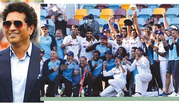 Sachin Tendulkar,  Right: Indiau2019s players and officials celebrate with the Border-Gavaskar Trophy after beating Australia at The Gabba in Brisbane yesterday.